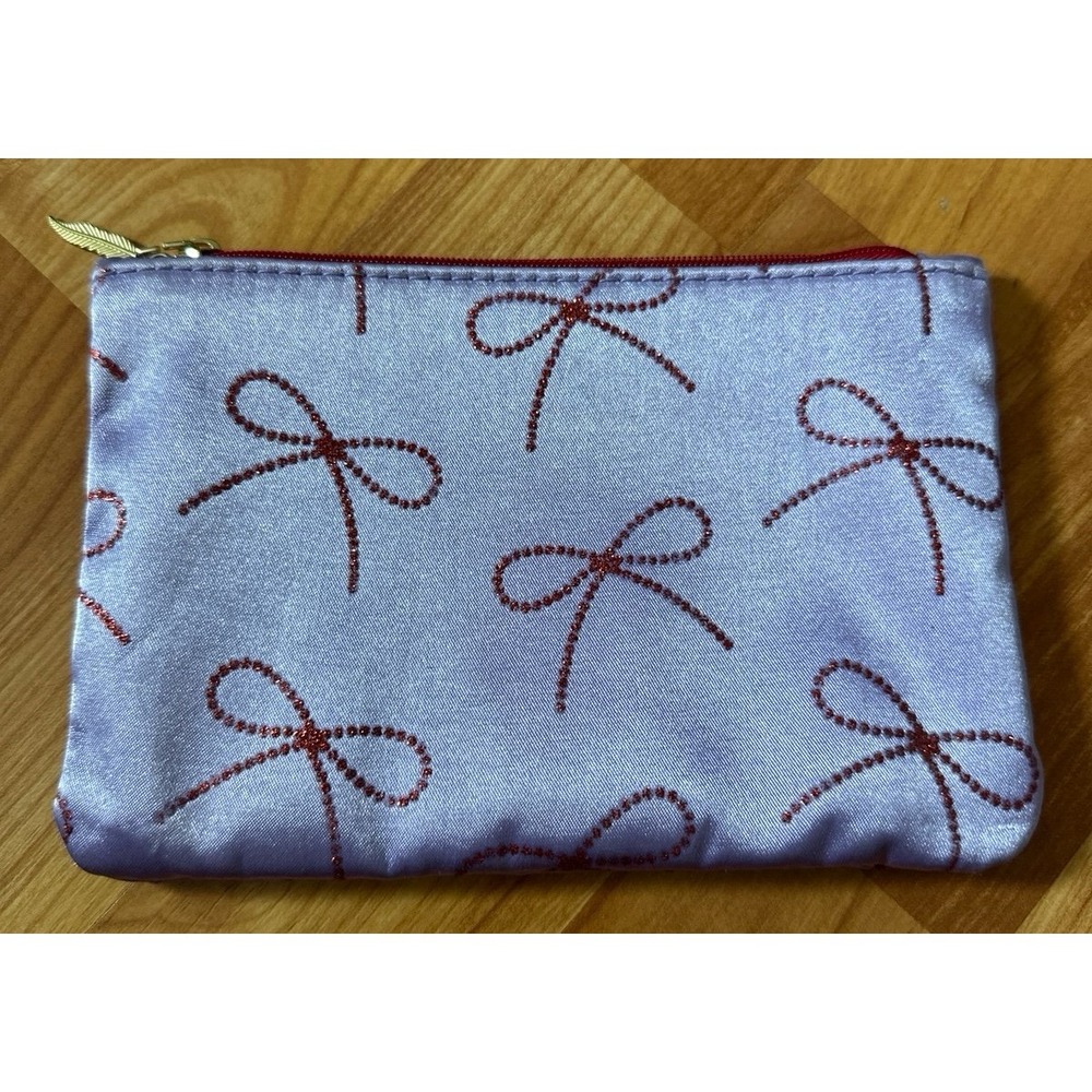 Ipsy lavender cosmetic bag from‎ the December 2025 Glam Bag collection,